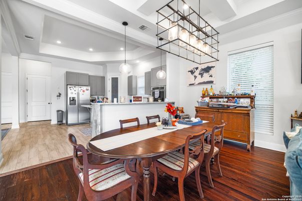 Dining room, Interior, Kitchen, Pendant Lights, Recessed Lighting, Stainless Steel Appliances, Wood Texture Flooring