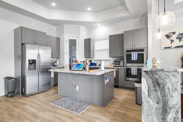 Interior, Kitchen, Pendant Lights, Recessed Lighting, Stainless Steel Appliances, Wood Texture Flooring