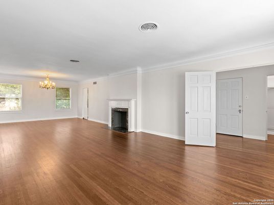 Chandelier, Empty room, Fireplace, Interior, Wood Texture Flooring