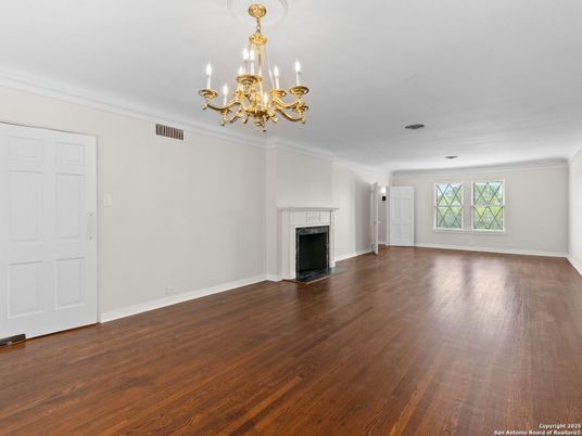 Chandelier, Empty room, Fireplace, Interior, Wood Texture Flooring