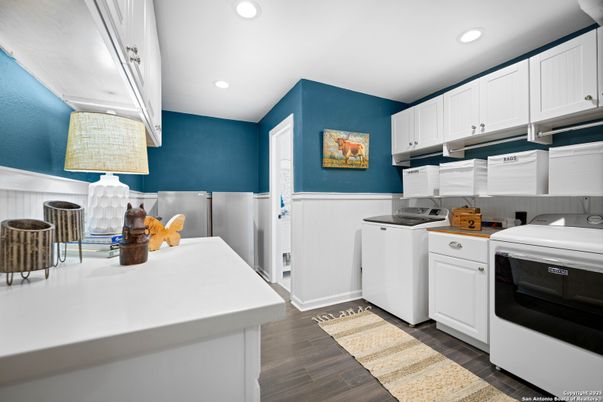 Interior, Kitchen, Recessed Lighting, Washer, Wood Texture Flooring