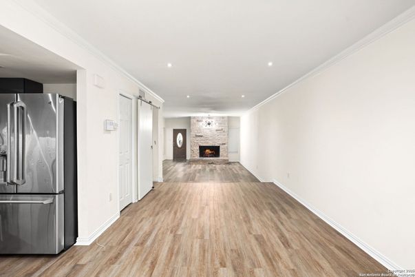 Empty room, Fireplace, Interior, Recessed Lighting, Wood Texture Flooring