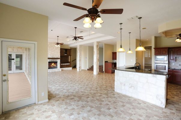 Fireplace, Interior, Kitchen, Pendant Lights, Recessed Lighting, Stainless Steel Appliances