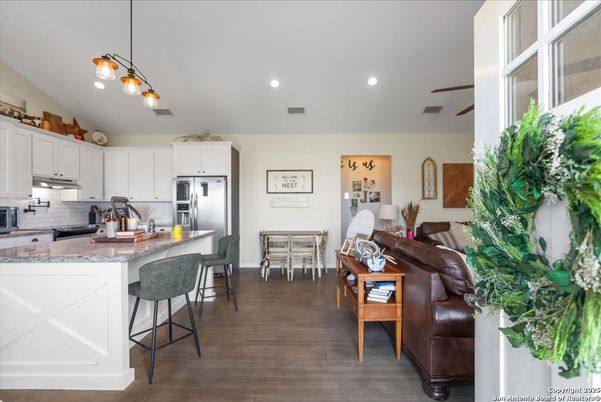 Dining room, Interior, Kitchen, Living room, Pendant Lights, Recessed Lighting, Stainless Steel Appliances, Wood Texture Flooring