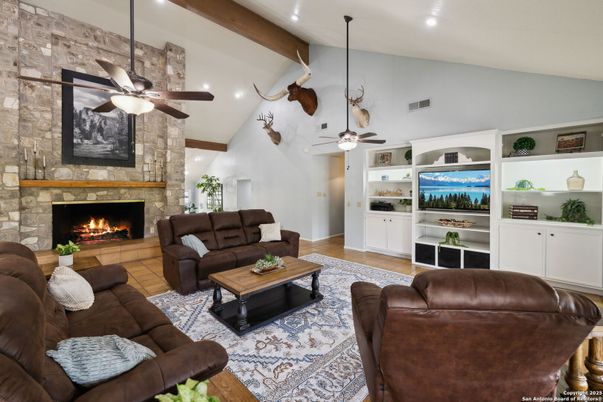 Fireplace, Interior, Living room, Recessed Lighting, Stone Walls, Wooden Beams, Wood Texture Flooring