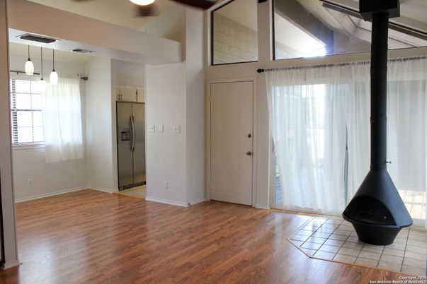 Empty room, Fireplace, Interior, Pendant Lights, Wood Texture Flooring
