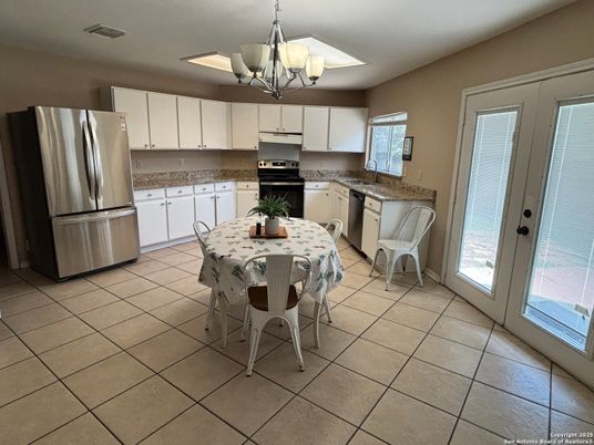 Chandelier, Dining room, Interior, Kitchen, Stainless Steel Appliances