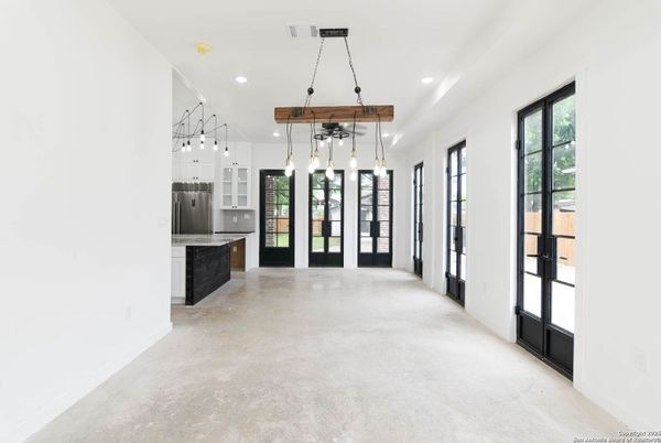 Empty room, Interior, Kitchen, Pendant Lights, Recessed Lighting, Stainless Steel Appliances, Wooden Beams