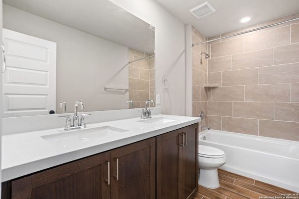Bathroom, Dual Sink Vanities, Interior, Recessed Lighting, Wood Texture Flooring
