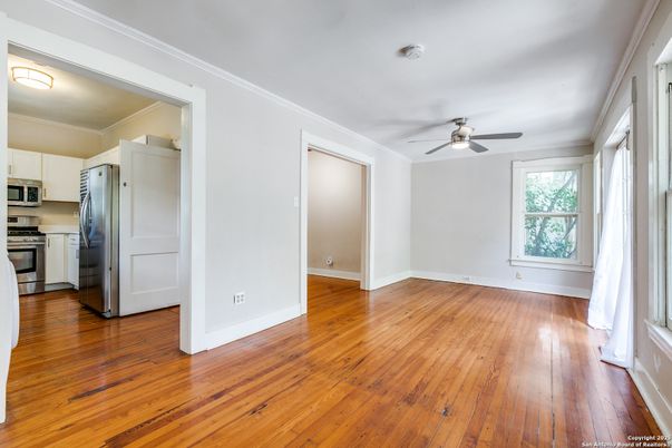 Empty room, Interior, Kitchen, Stainless Steel Appliances, Wood Texture Flooring