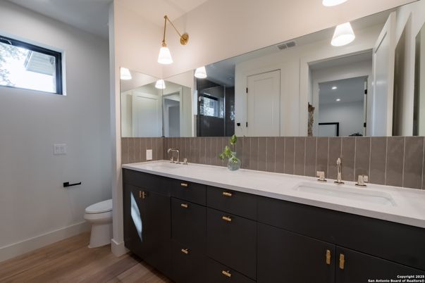 Bathroom, Dual Sink Vanities, Interior, Pendant Lights, Wood Texture Flooring