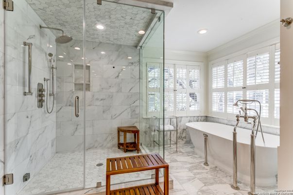 Bathroom, Free Standing Baths, Glass Shower, Interior, Marble, Marble Walls, Recessed Lighting