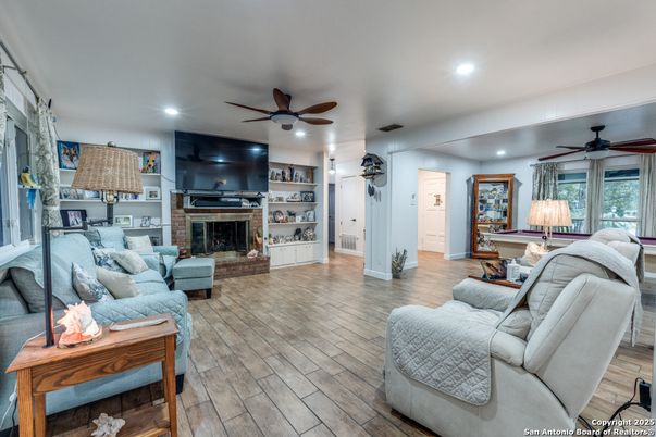 Fireplace, Interior, Living room, Recessed Lighting, Wood Texture Flooring