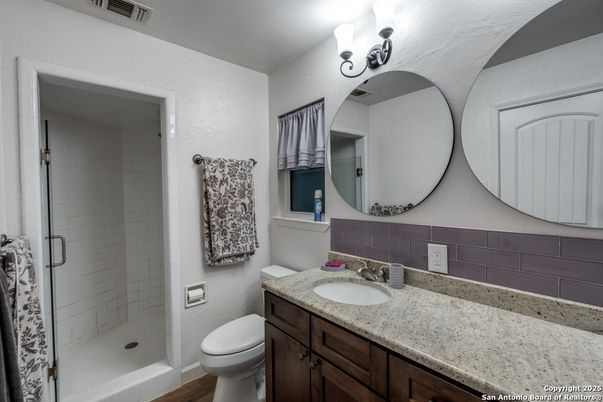 Bathroom, Dual Sink Vanities, Glass Shower, Interior, Wood Texture Flooring