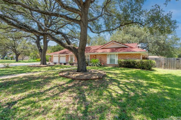 Attached, Backyard, Exterior, Facade, Brick Facade, Ranch