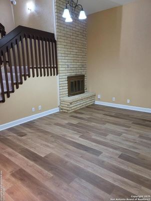 Empty room, Fireplace, Interior, Pendant Lights, Wood Texture Flooring