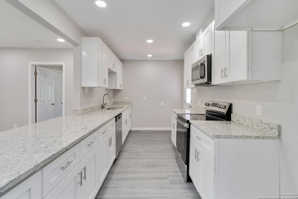 Interior, Kitchen, Recessed Lighting, Stainless Steel Appliances, Wood Texture Flooring