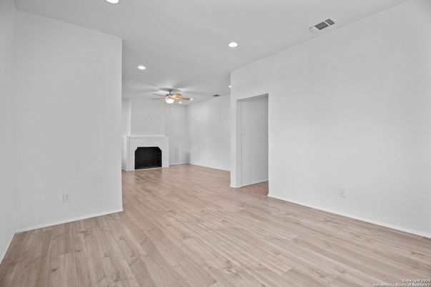 Empty room, Fireplace, Interior, Recessed Lighting, Wood Texture Flooring