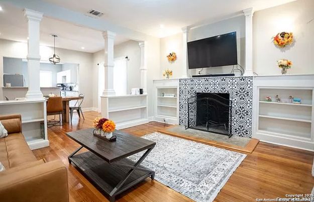Dining room, Fireplace, Interior, Kitchen, Pendant Lights, Recessed Lighting, Wood Texture Flooring