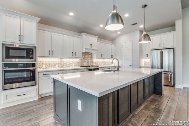Interior, Kitchen, Pendant Lights, Recessed Lighting, Stainless Steel Appliances, Wood Texture Flooring