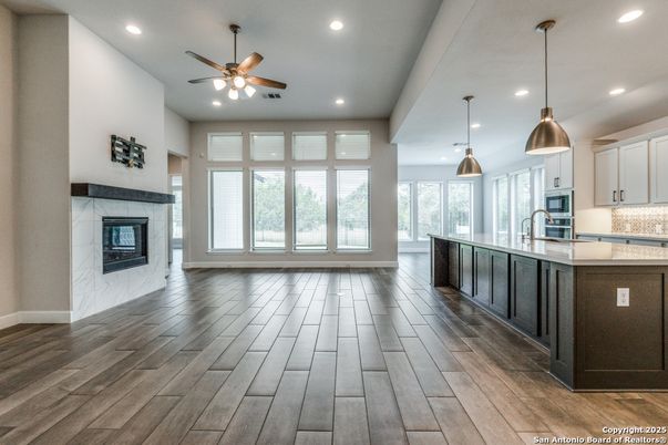 Fireplace, Interior, Kitchen, Pendant Lights, Recessed Lighting, Wood Texture Flooring
