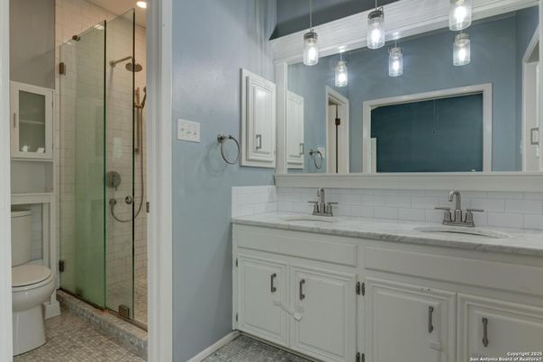 Bathroom, Dual Sink Vanities, Glass Shower, Interior, Pendant Lights