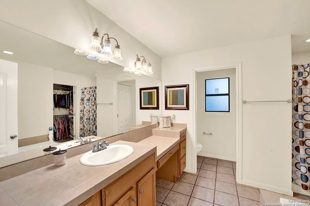 Bathroom, Dual Sink Vanities, Interior, Recessed Lighting, Tile Countertops