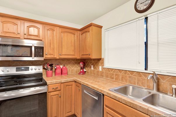 Interior, Kitchen, Stainless Steel Appliances, Tile Countertops