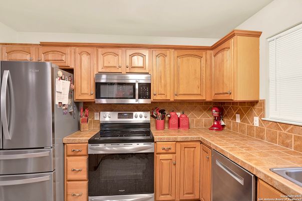 Interior, Kitchen, Stainless Steel Appliances, Tile Countertops