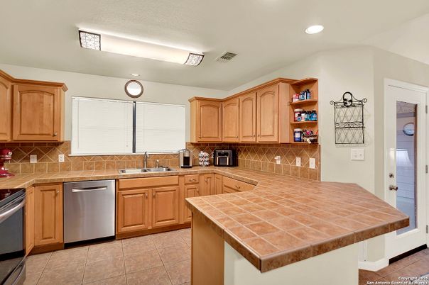 Interior, Kitchen, Recessed Lighting, Tile Countertops
