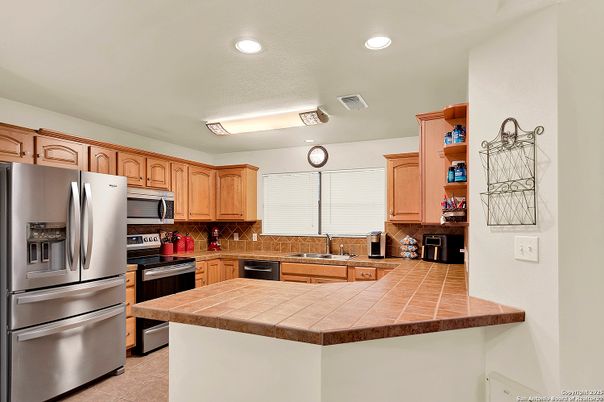 Interior, Kitchen, Recessed Lighting, Tile Countertops