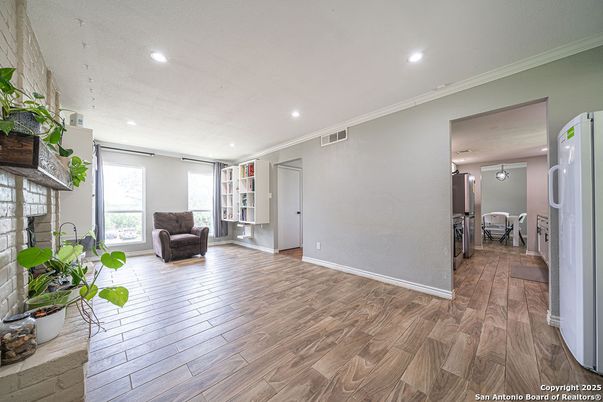 Dining room, Fireplace, Interior, Recessed Lighting, Wood Texture Flooring
