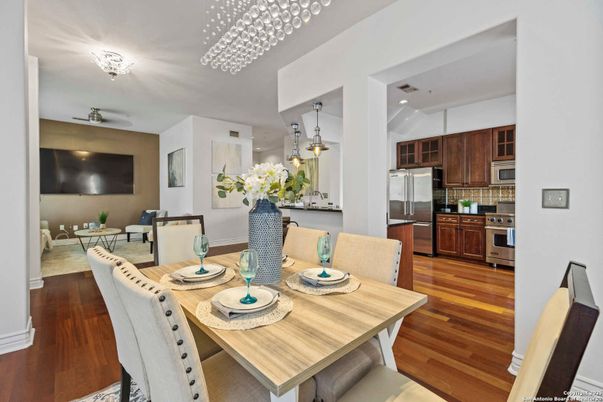 Dining room, Interior, Kitchen, Living room, Pendant Lights, Recessed Lighting, Stainless Steel Appliances, Wood Texture Flooring
