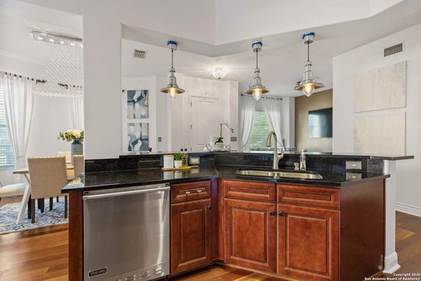 Dining room, Interior, Kitchen, Pendant Lights, Stainless Steel Appliances, Wood Texture Flooring