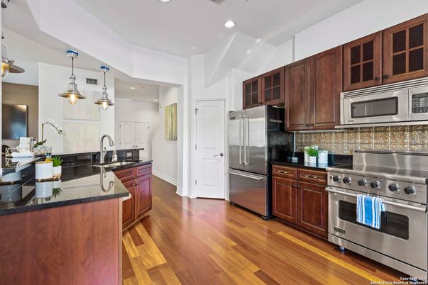 Interior, Kitchen, Pendant Lights, Recessed Lighting, Stainless Steel Appliances, Wood Texture Flooring
