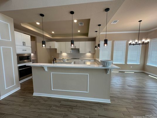 Chandelier, Interior, Kitchen, Pendant Lights, Recessed Lighting, Stainless Steel Appliances, Wood Texture Flooring