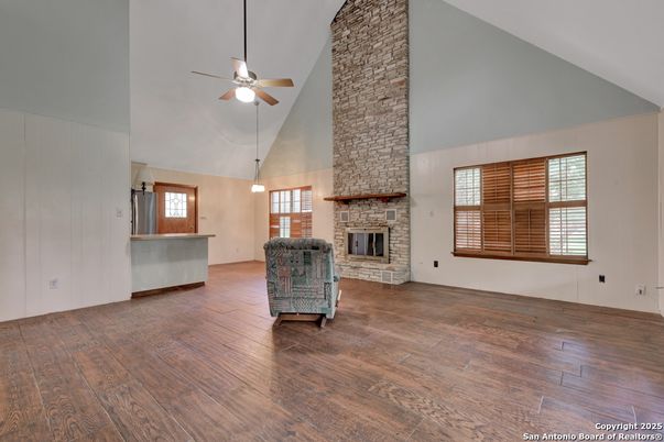 Empty room, Fireplace, Interior, Pendant Lights, Stone Walls, Wood Texture Flooring