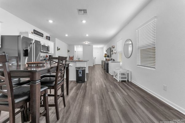 Dining room, Interior, Kitchen, Recessed Lighting, Stainless Steel Appliances, Wood Texture Flooring