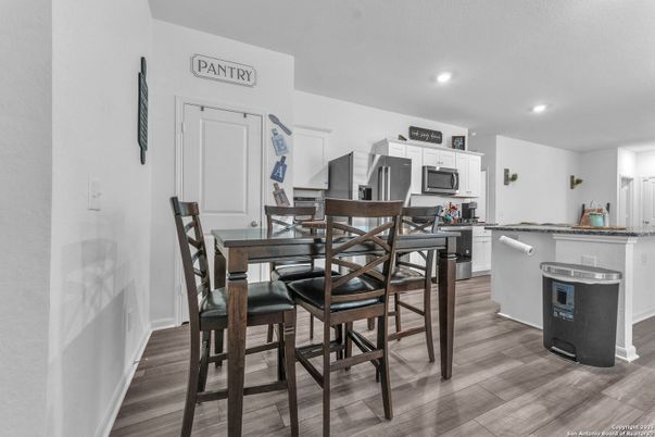 Dining room, Interior, Kitchen, Recessed Lighting, Stainless Steel Appliances, Wood Texture Flooring