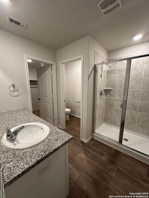 Bathroom, Glass Shower, Interior, Recessed Lighting, Wood Texture Flooring