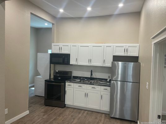 Interior, Kitchen, Recessed Lighting, Stainless Steel Appliances, Wood Texture Flooring