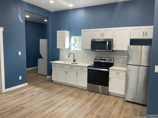 Interior, Kitchen, Recessed Lighting, Stainless Steel Appliances, Wood Texture Flooring