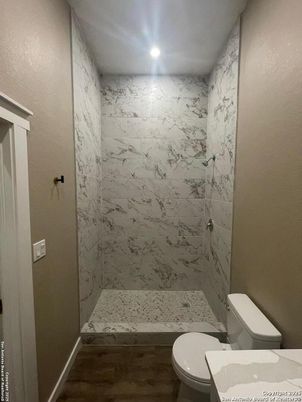 Bathroom, Interior, Marble Walls, Recessed Lighting, Wood Texture Flooring