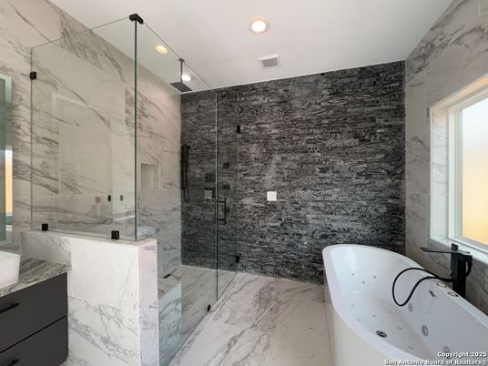 Bathroom, Free Standing Baths, Glass Shower, Interior, Marble, Marble Walls, Recessed Lighting