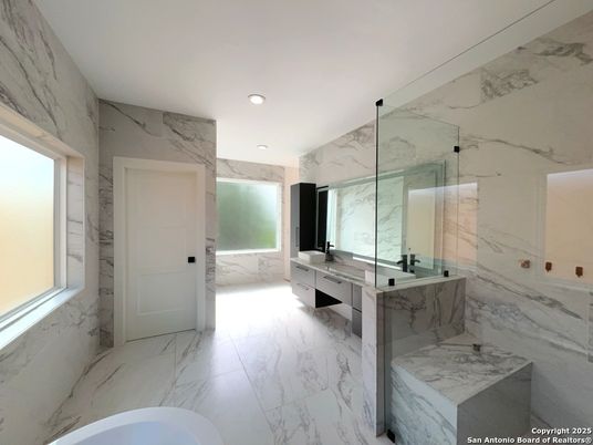 Bathroom, Dual Sink Vanities, Interior, Marble, Marble Walls, Recessed Lighting