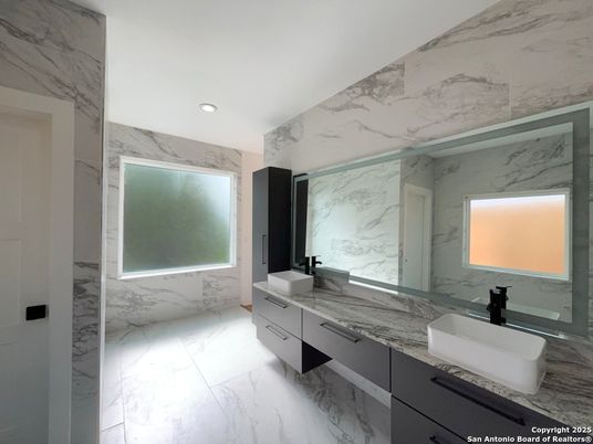 Bathroom, Dual Sink Vanities, Interior, Marble, Marble Walls, Recessed Lighting