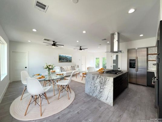 Dining room, Interior, Kitchen, Recessed Lighting, Stainless Steel Appliances, Wood Texture Flooring
