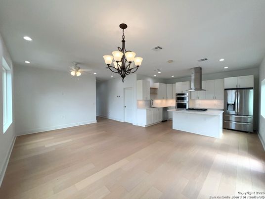 Chandelier, Interior, Kitchen, Recessed Lighting, Stainless Steel Appliances, Wood Texture Flooring