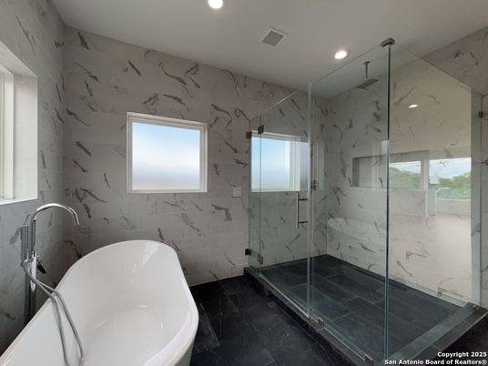 Bathroom, Free Standing Baths, Glass Shower, Interior, Marble Walls, Recessed Lighting