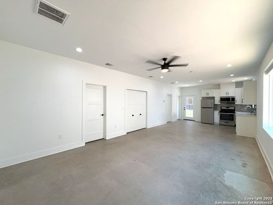 Empty room, Interior, Kitchen, Recessed Lighting, Stainless Steel Appliances